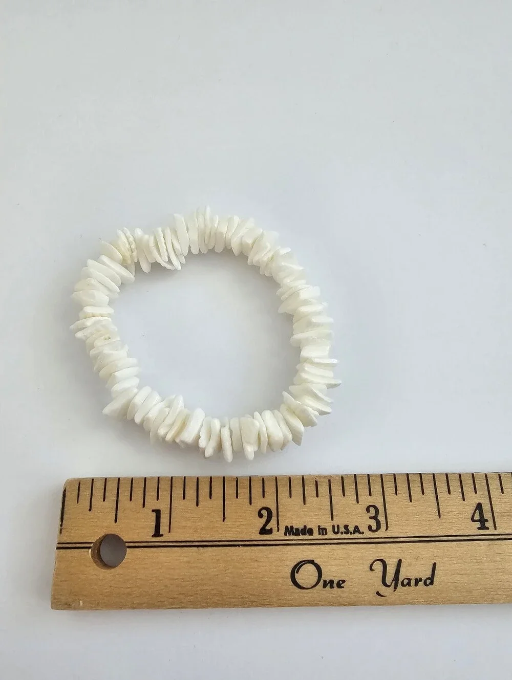 Vintage white puka
